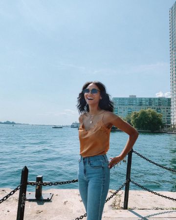 Greta Onieogou is posing for the photo.